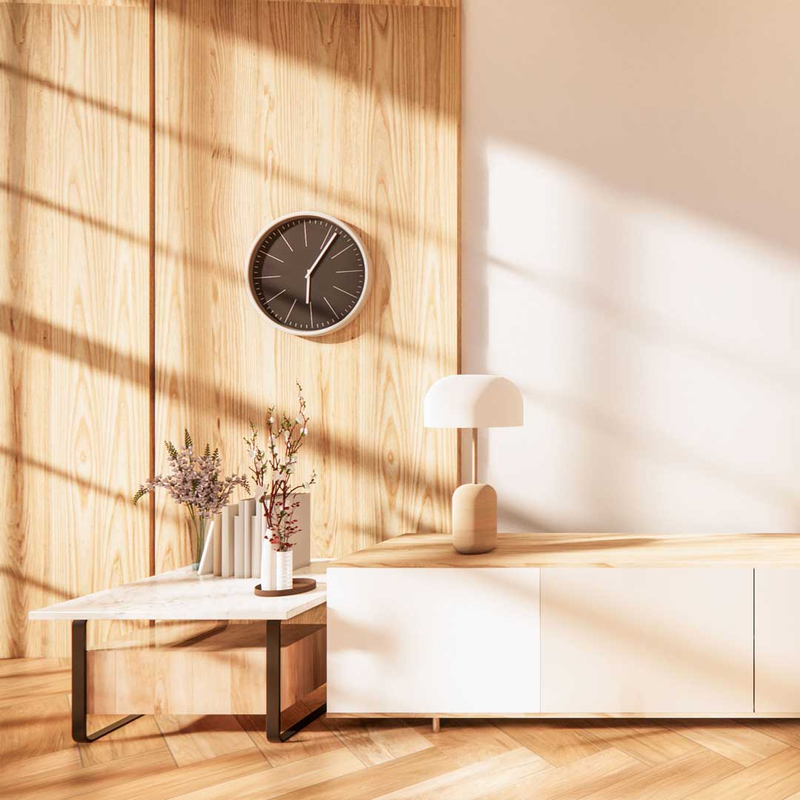 Wood wall panels and floor with modern light wood furniture and lamp
