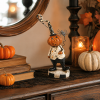 Design Shop 6 Inch Resin Pumpkin Man Holding Black Spider