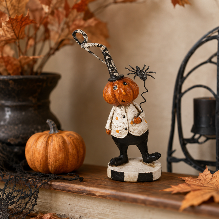 Design Shop 6 Inch Resin Pumpkin Man Holding Black Spider