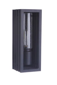 A textured black outdoor wall mount lantern with a clear-seeded glass shade and a vintage-inspired design.