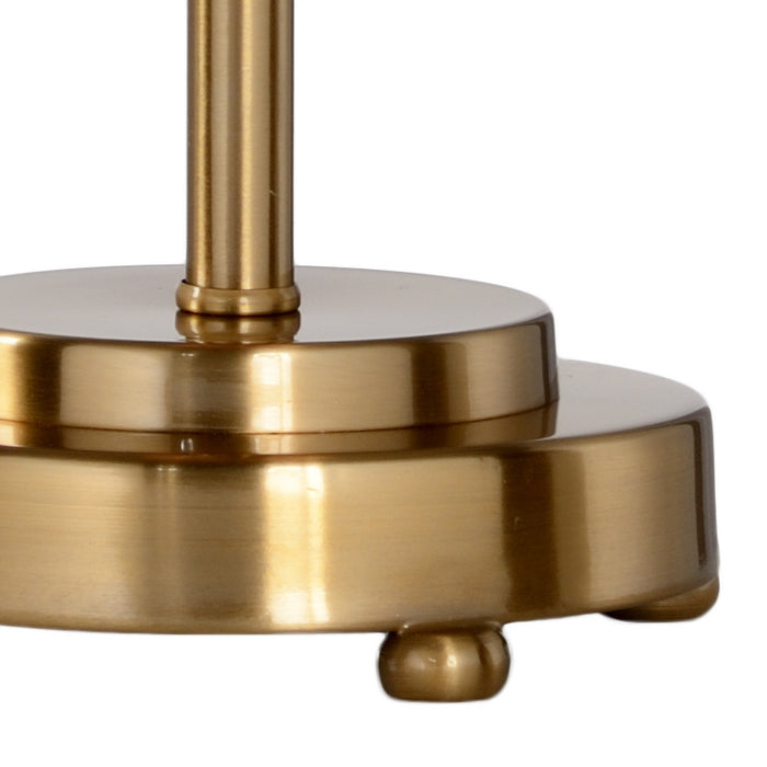 Close-up of a gold metal object on a white background