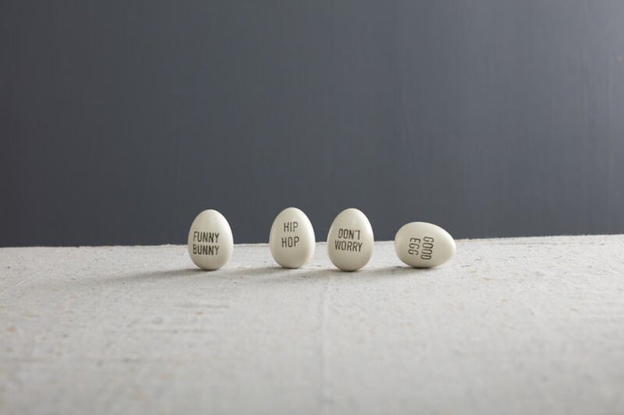 Design Shop White Spritz Egg - Set of 4 text, 1.75" X 2".