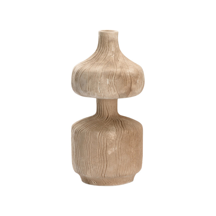Wooden vase with textured surface on a white background