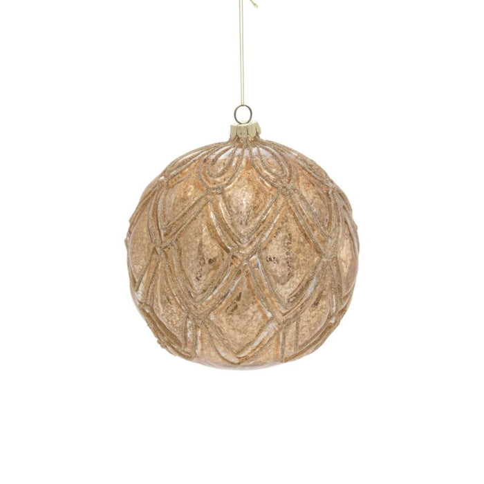 Decorative beige ball ornament with intricate patterns on a white background