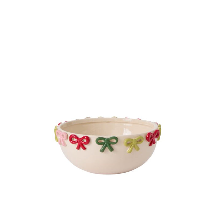 Decorative bowl with colorful bow designs on a white background