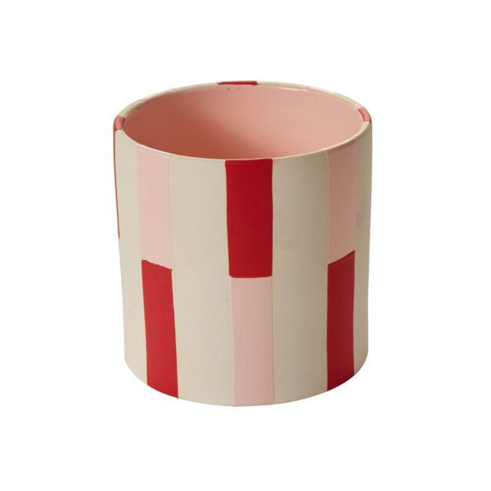 Cylindrical container with red and pink striped pattern on a white background