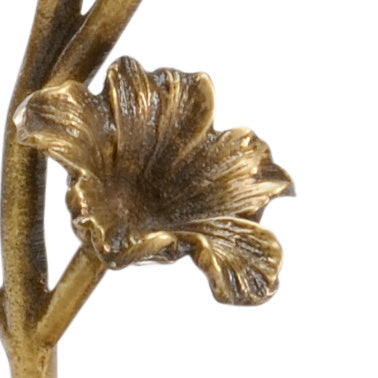 Bronze flower sculpture on a white background