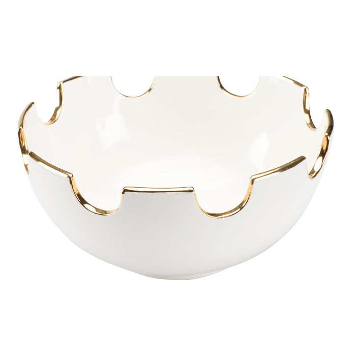 White decorative bowl with gold rim on a white background