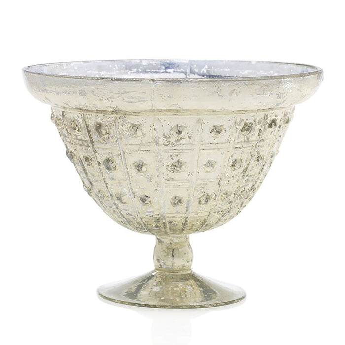 Decorative glass bowl with textured surface on a white background