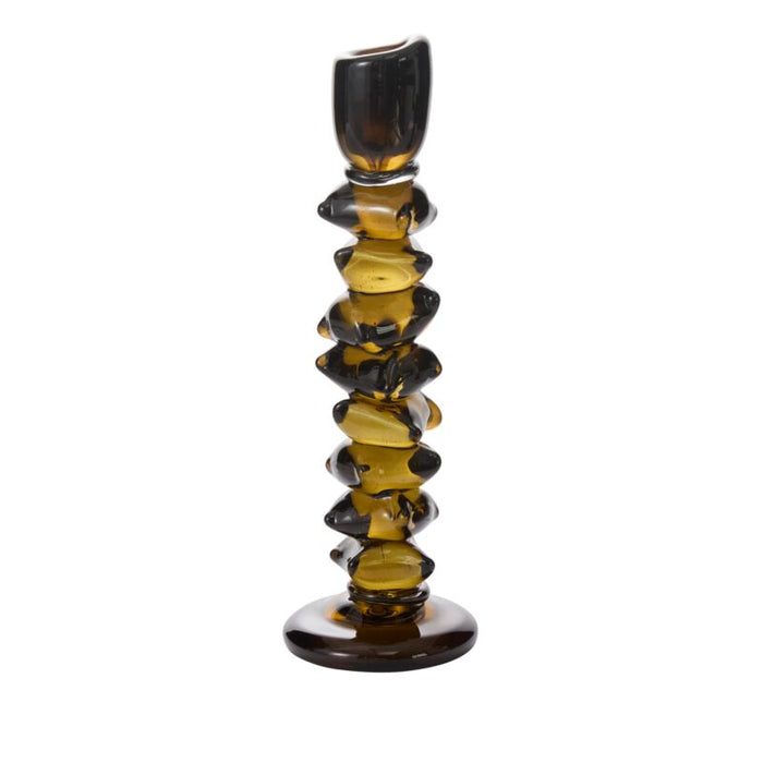 Decorative glass candle holder with a white background