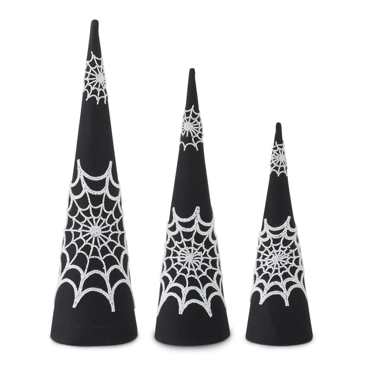 Three black cone-shaped decorations with white spider web patterns on a white background