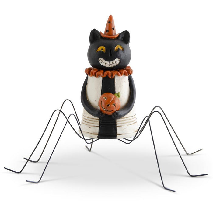 Halloween-themed black cat decoration with a spider web and pumpkin on a white background