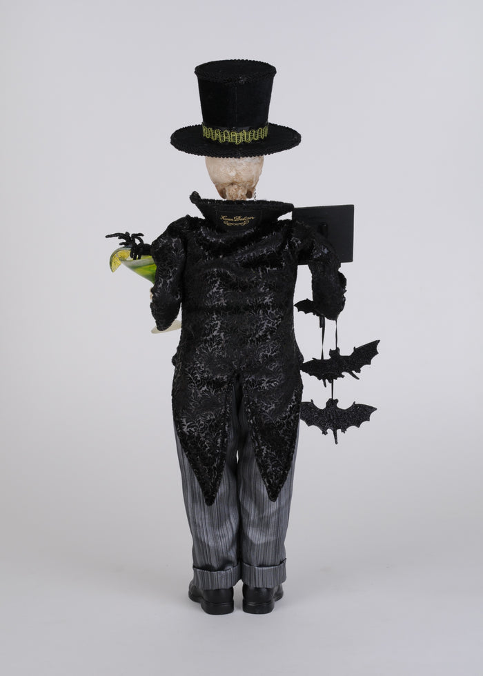 Gothic-style figure with top hat, black coat, and gray pants on a white background