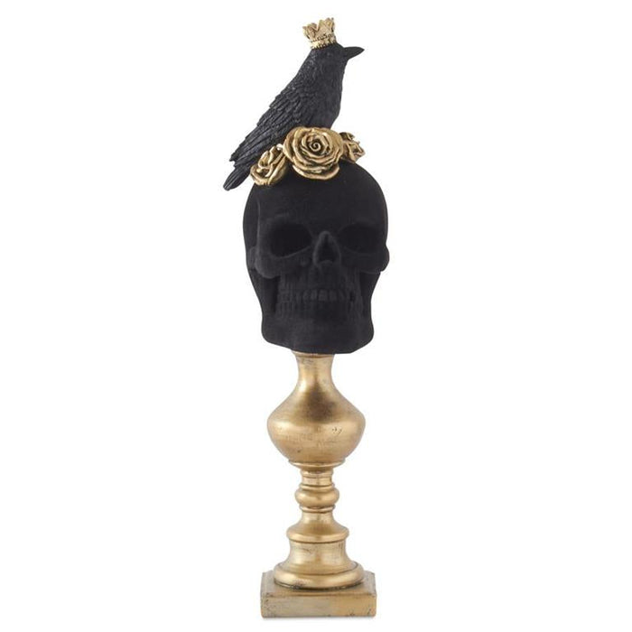 Decorative skull with a crow and gold rose on a white background
