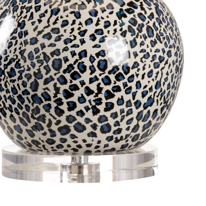 Decorative sphere with leopard print pattern on a white background