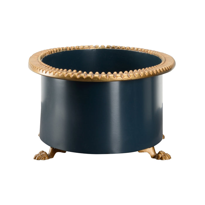 Decorative metal planter with gold rim and feet on a white background