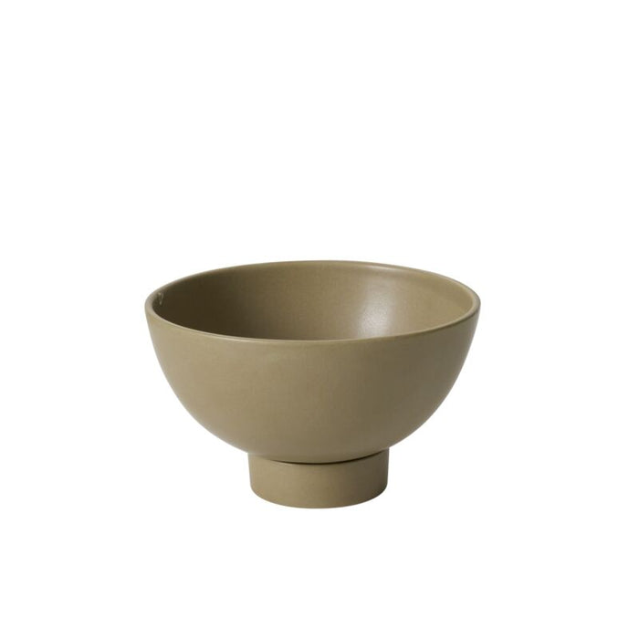 Beige ceramic bowl on a white background