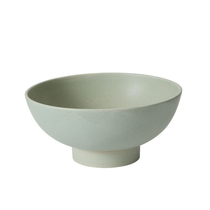 Light green ceramic bowl on a white background