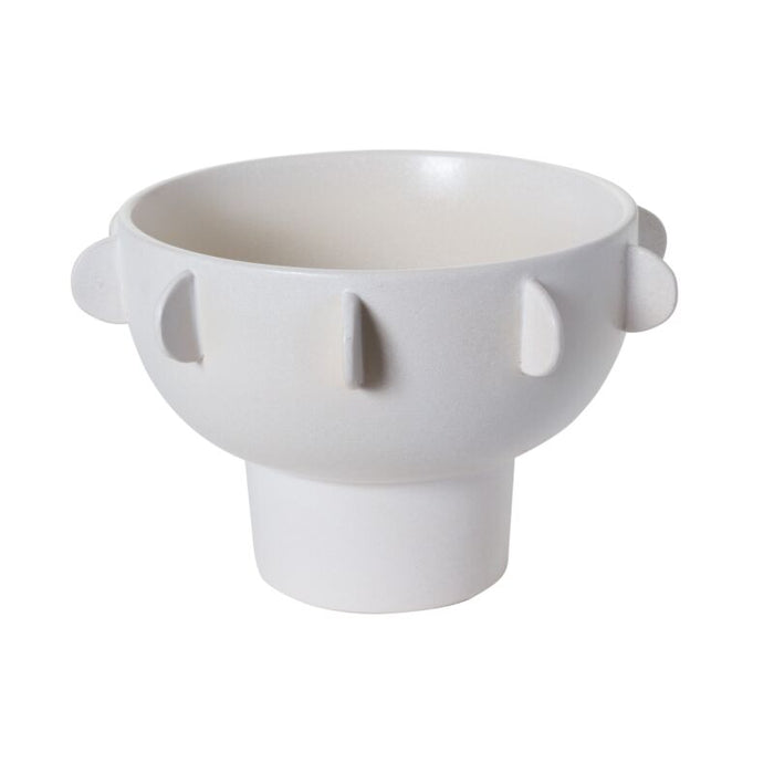 White ceramic bowl with unique design on a white background