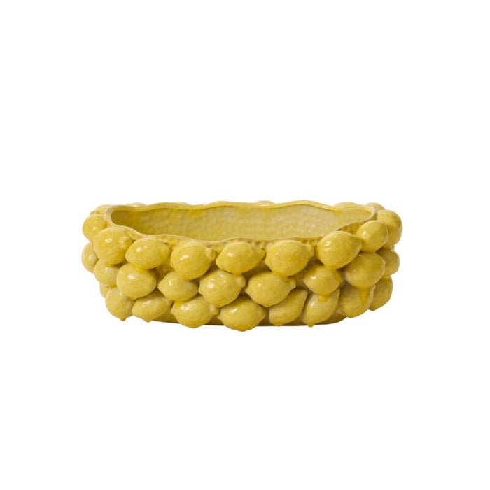 Yellow woven basket on a white background