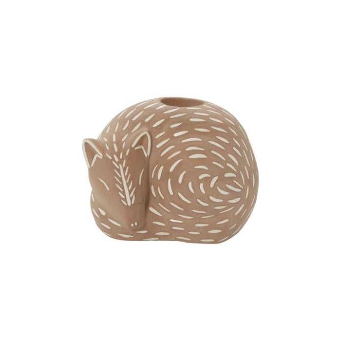 Ceramic fox-shaped vase on a white background