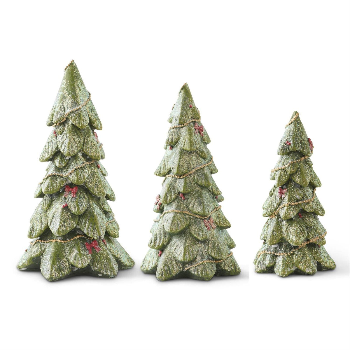 Three decorative Christmas trees with greenery and red accents on a white background