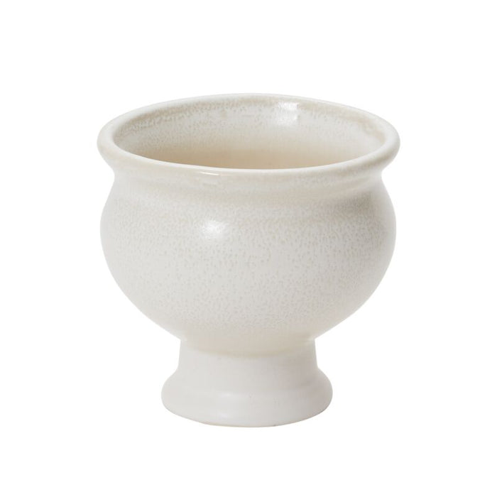 White ceramic footed bowl on a white background