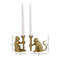 Gold-toned candle holder with two mice figures kneeling beside tall white taper candles, each holding a candle; left mouse