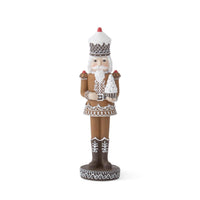 12.25" Gingerbread Nutcracker Holding White Cupcake Tree