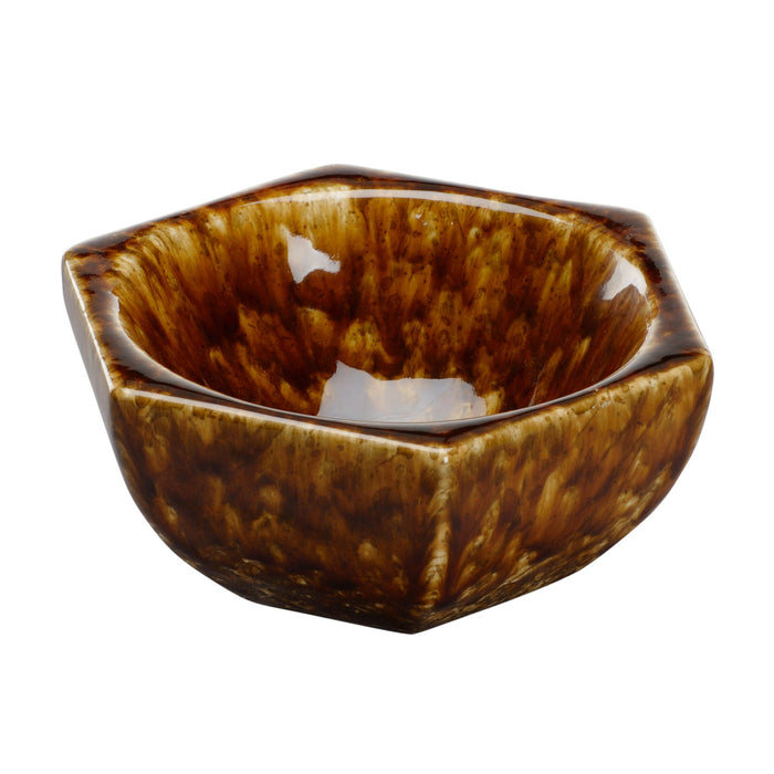 Hexagonal brown ceramic bowl on a white background