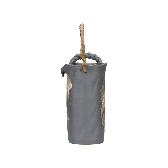 Gray umbrella with a decorative handle on a white background