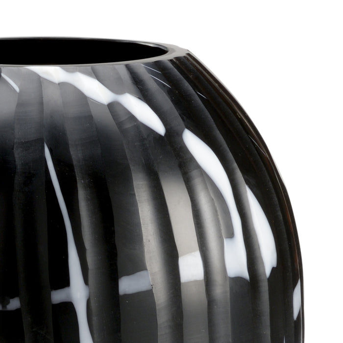 Black and white striped vase on a white background