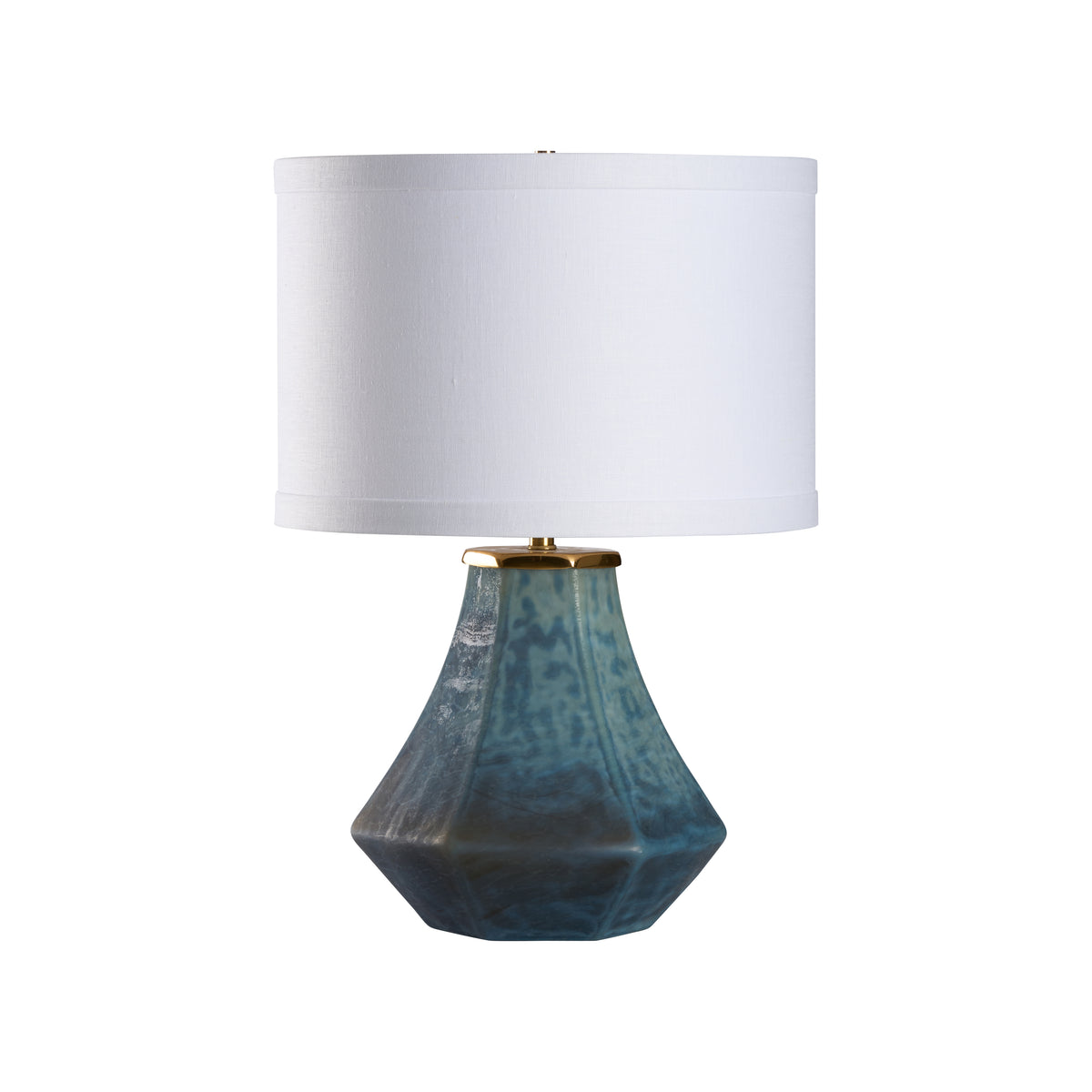Table lamp with a blue ceramic base and white shade on a white background