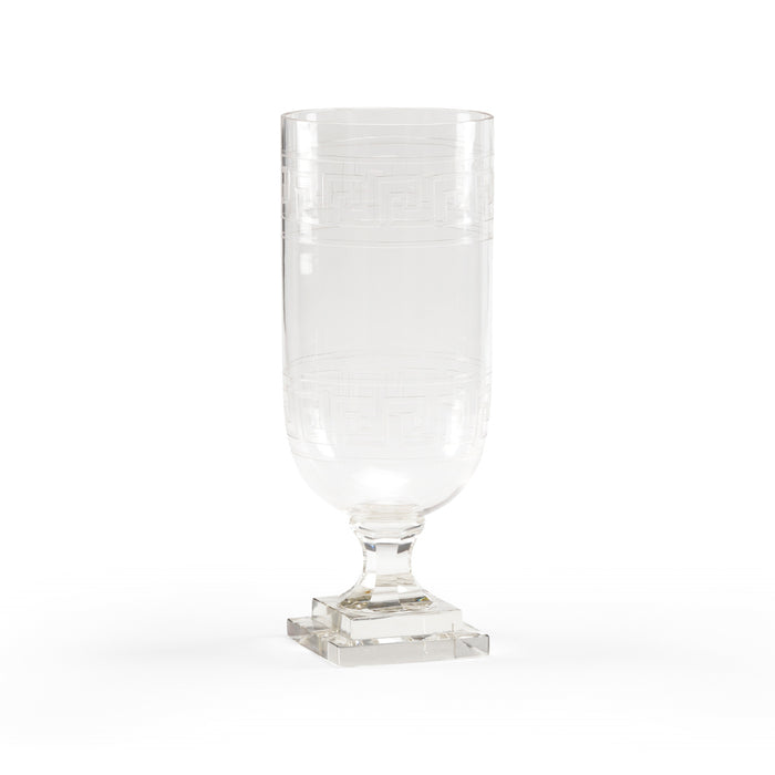 Clear glass with square base on a white background