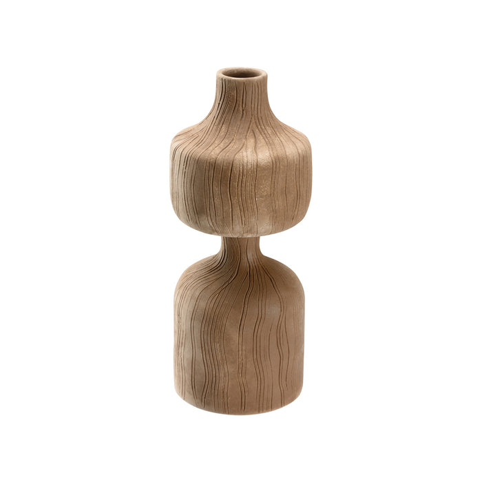 Wooden vase with textured design on a white background