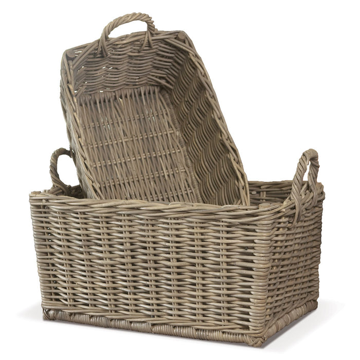 A set of two beige rattan laundry baskets with handles.