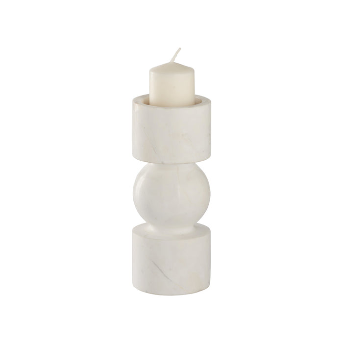 White marble candle holder with a white candle on a white background