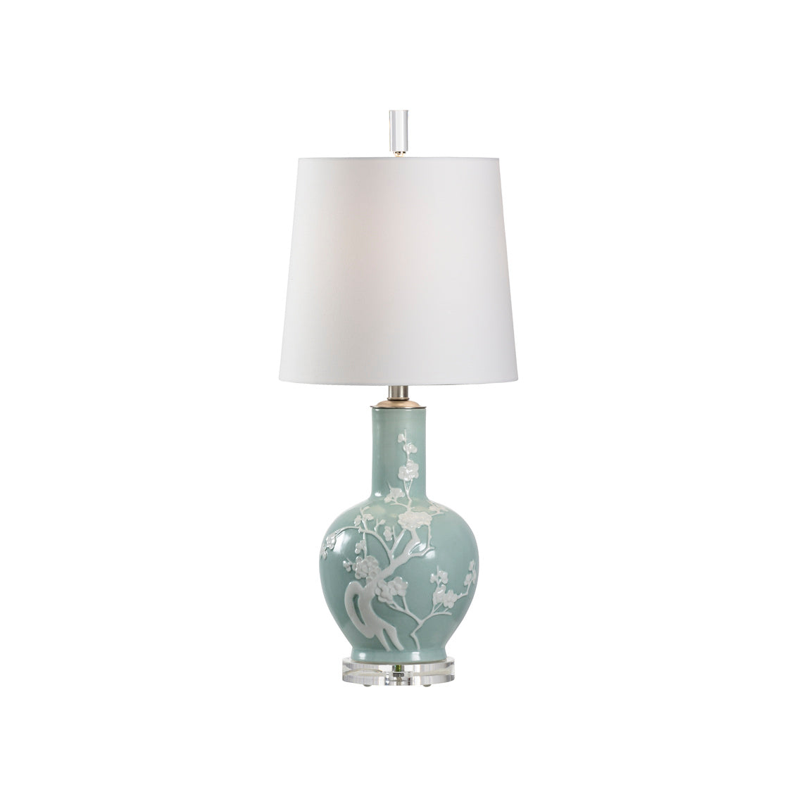 Decorative table lamp with a light blue base and white shade on a white background