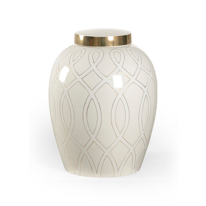 White ceramic urn with gold geometric design on a white background