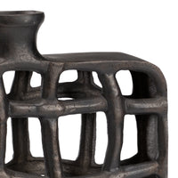 Close-up of a textured metal stool on a white background