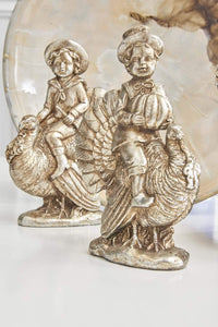 Design Shop Assorted 7.25 Inch Antique Silver Resin Children with Turkeys, Set of 3