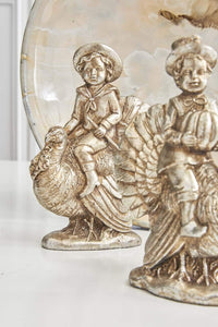 Design Shop Assorted 7.25 Inch Antique Silver Resin Children with Turkeys, Set of 3