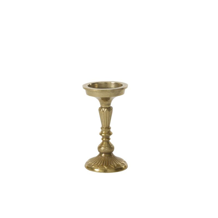 Gold candle holder on a white background