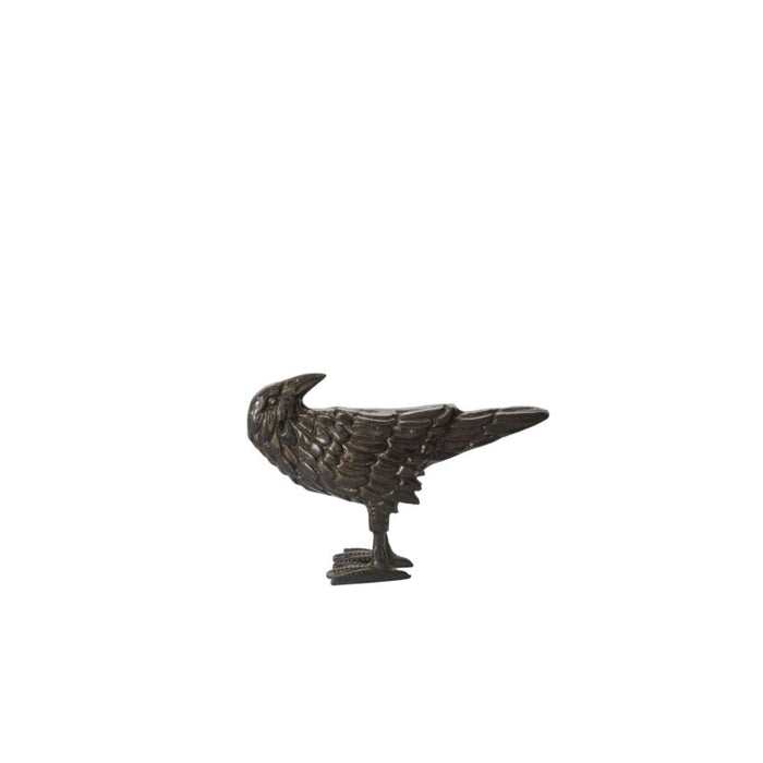 Bronze bird sculpture on a white background