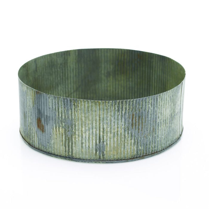 A silver bowl from the Design Shop Silver Norah Collection with a textured interior.