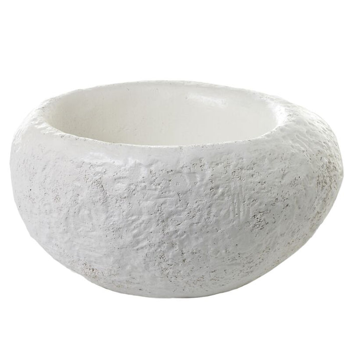 White textured round heart-shaped bowl with rough stone-like exterior and smooth interior, open top, on white background.