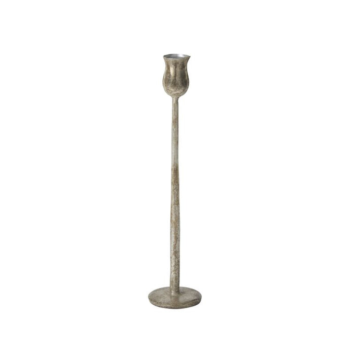 Tall metallic candle holder on a white background