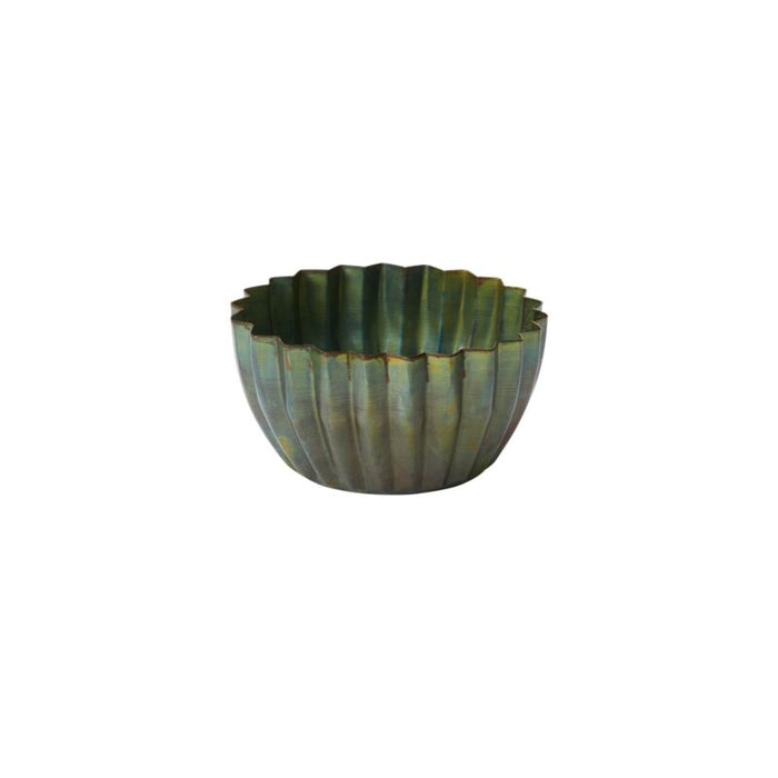 Decorative bowl with ribbed texture on a white background