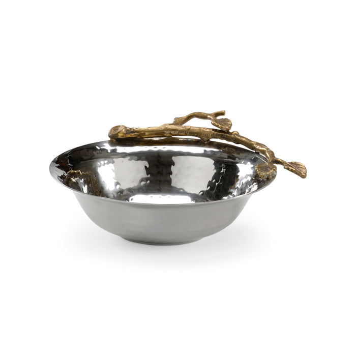 Silver bowl with a branch on a white background