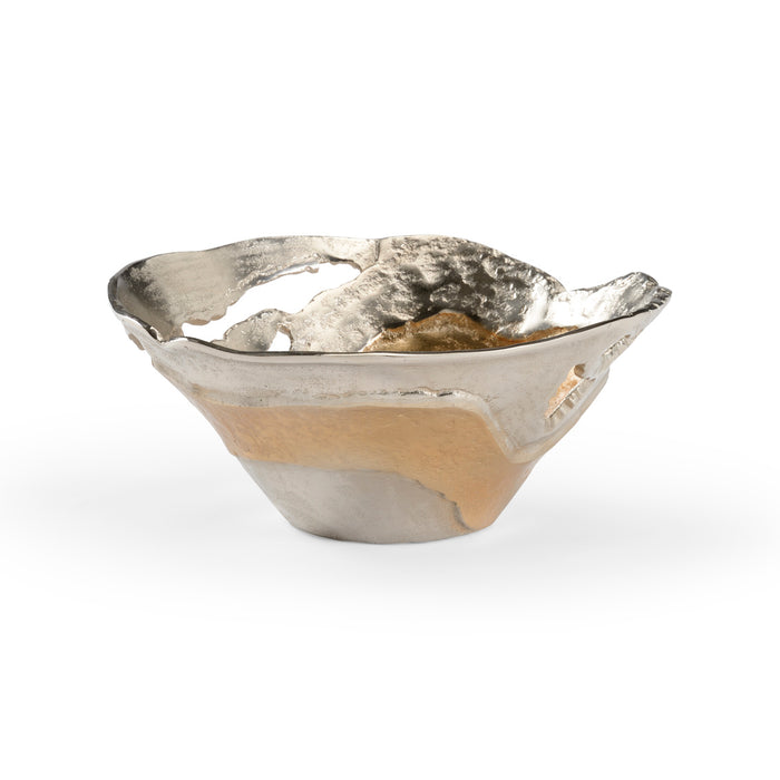 Silver and gold decorative bowl on a white background